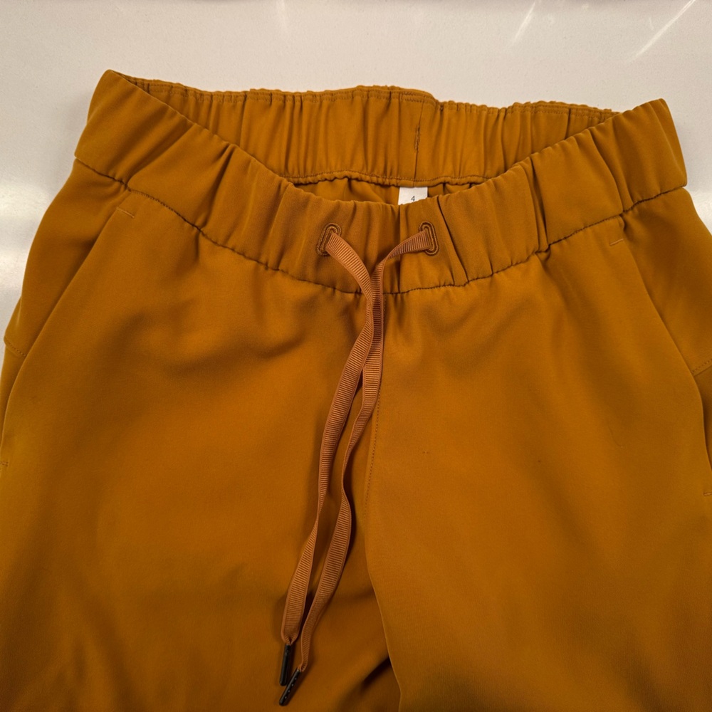 Mustard yellow 
Yoga workout pants 
Ankle length
Cropped 
New 
Never used